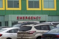 Alberta Children\'s Hospital Emergency entrance with a busy parking lot.