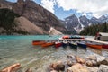 Canoes at the boathouse on Morinae Lake in the summer in the Canadian Rockies Royalty Free Stock Photo