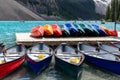 Canoes at the boathouse on Morinae Lake in the summer in the Canadian Rockies Royalty Free Stock Photo