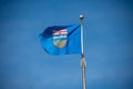 Alberta flag against blue sky