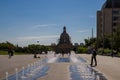 Alberta Legislature Building in Edmonton, Canada. People play in fountain