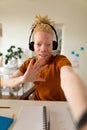 Albino african american man working from home making video call