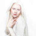 Albino woman with white pure skin and white hair. Photo face on a light background. Portrait of the head. Blonde girl Royalty Free Stock Photo