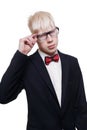 Albino young man portrait in eyeglasses and suit isolated.