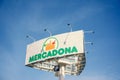 Albir, Spain - May 27, 2023: Mercadona store supermarket logo signboard on blue sky background. Mercadona is popular