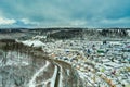 Albstadt, snow city at the Schwaebische Alb of germany in white powdered winter landscape with cloudy blue sky. Royalty Free Stock Photo