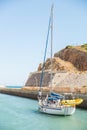 Private sailboat leaving for a cruise from the bay of Marina de Albufeira Royalty Free Stock Photo