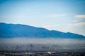 Albuquerque new mexico skyline in smog with mountains