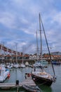 AlcÃ¢ntara, Lisbon PORTUGAL - May 29, 2022 - Harbor with recreational boats moored at dusk and clouds Royalty Free Stock Photo