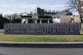 Alcala de henares town entrance lettering sign in sunny day