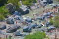 ALCANTARA, ITALY - AUGUST, 2015: People enjoy ice-cold water of Alcantara river in the Alcantara river park in August, 2015 in Sic
