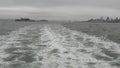 Alcatraz island in San Francisco Bay, California USA. Federal prison for gangsters on rock, foggy weather. Historic jail, cliff in Royalty Free Stock Photo