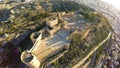 Defense Walls of Ancient fortress Alcazaba of Almeria, Spain - aerial shot including panoramic view of the Almeria city Royalty Free Stock Photo