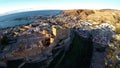 Defense Walls of Ancient fortress Alcazaba of Almeria, Spain - aerial shot including panoramic view of the Almeria city Royalty Free Stock Photo