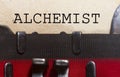 Alchemist typed on a vintage paper