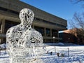 Alchemist statue with the Julius Adams Stratton building in the background