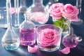 Alchemy and aromatherapy with rose flowers and chemical flasks