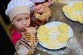 Alchevsk, Ukraine - March 11, 2018: children in the form of cooks at school small cooks in a cafe