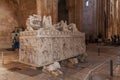 Alcobaca, Portugal - July 17, 2017: Gothic Tomb of Queen Ines de Castro with recumbent effigy and angels. Monastery of Santa Maria