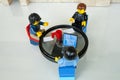 Alcobendas, Spain - May 14, 2018: Working team, working together around a round table. LEGO minifigures concept, Lego minifigures