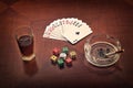 Alcohol, cards, dice and cigarette Royalty Free Stock Photo