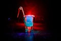 Alcohol cocktail in glass with ice in smoke on dark background. Club drinks concept. One glass of cocktail. Selective focus Royalty Free Stock Photo