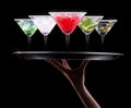 Alcohol cocktail set on a waiter tray