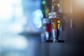 Alcohol, drink and closeup of tap in nightclub for cocktail shots, pour alcoholic beverage and beer. Bartending, liquor Royalty Free Stock Photo