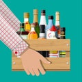 Alcohol drinks collection in box in hand