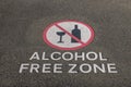 Alcohol free zone sign on pavement Royalty Free Stock Photo
