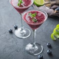 Alcohol frozen blueberry cocktail margarita with tequila and lime Royalty Free Stock Photo