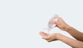 Alcohol hand sanitizer on woman`s hand