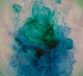 Alcohol ink mixed and merged with water giving abstract effect