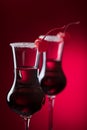 Alcohol layered shot cocktail garnished with cherry . Royalty Free Stock Photo