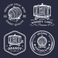 Alcohol logos.Wooden barrels set with drinks signs of cognac,brandy,whiskey,wine,beer.Labels, badges with sketched kegs.