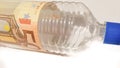 Alcohol lotion wrapped with fifty euro banknote