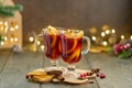 Alcohol red mulled wine. Selective focus, blurred background, christmas decor Royalty Free Stock Photo
