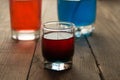 Alcohol shot drink two layers red and blue Royalty Free Stock Photo