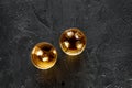 Shots of whiskey with ice on black bar table background top view mock up Royalty Free Stock Photo