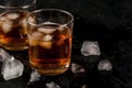 Alcohol whiskey cocktail with cola and ice