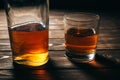 Alcoholic addict. Empty bottle and a glass. Dangerous habit. Unhealthy life concept. Social problem