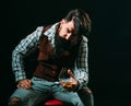 Alcoholic addiction - get the treatment you need. Drunk man holding whisky glass after he drank a lot of alcohol and Royalty Free Stock Photo