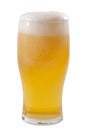 Alcoholic beverage and summer refreshing drink concept with a frosty glass of beer frothing and the froth close to spelling over