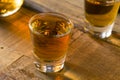 Alcoholic Brown Rum in a Shot Glass Royalty Free Stock Photo