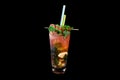 Alcoholic cocktail on a black background, decorated with a skewer with berries and straws Royalty Free Stock Photo