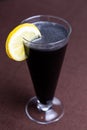alcoholic cocktail with cola and lemon. Photo for menu