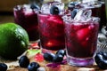 Alcoholic cocktail Darkside, with liqueur, blueberry, lime juice Royalty Free Stock Photo