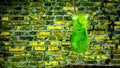 Alcoholic cocktail in a glass on a brick wall background. Green lemonade with ice. Summer fresh drink Royalty Free Stock Photo