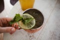 Alcoholic cocktail - lime, mint leaves. Cold moscow mule cocktail in copper mug Royalty Free Stock Photo