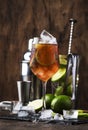 Alcoholic cocktail Long Island with vodka, gin, tequila silver, white rum, liqueur, sugar syrup, lemon juice, cola and ice cubes, Royalty Free Stock Photo